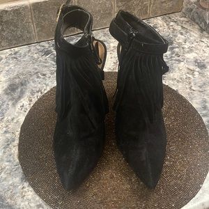 Black closed toe fringe heels